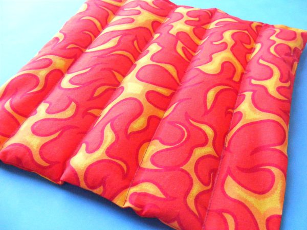 Finished rice bag made with flame fabric and the free Rice Bag pattern from Shiny Happy World