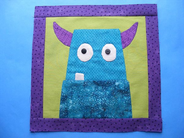 How to Make a Pillow Out of Any Quilt Block - a free tutorial from Shiny Happy World