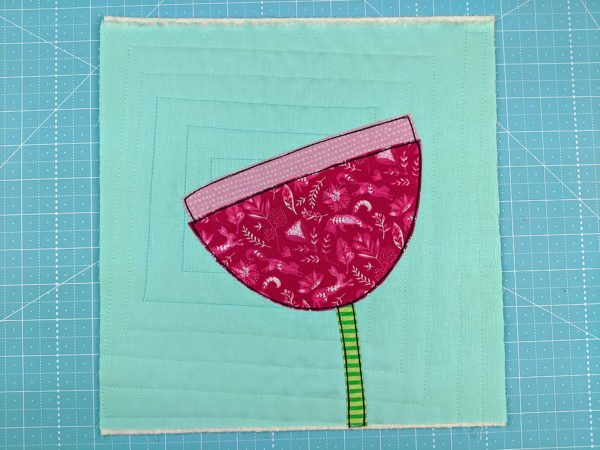 finished flower applique using the Pretty Posy free applique pattern from Shiny Happy World