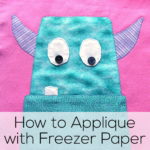 Cute turquoise monster face appliqued on a pink quilted background. Text reads: How to Applique with Freezer Paper