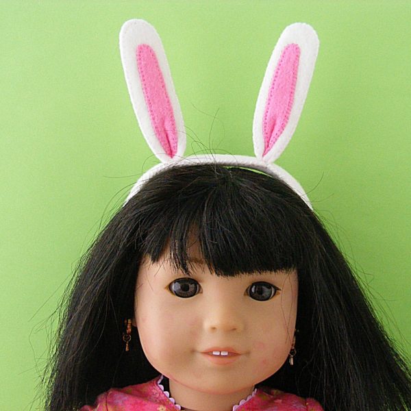 Ivy (American Girl doll) wearing felt bunny ears made with a free pattern from Shiny Happy World