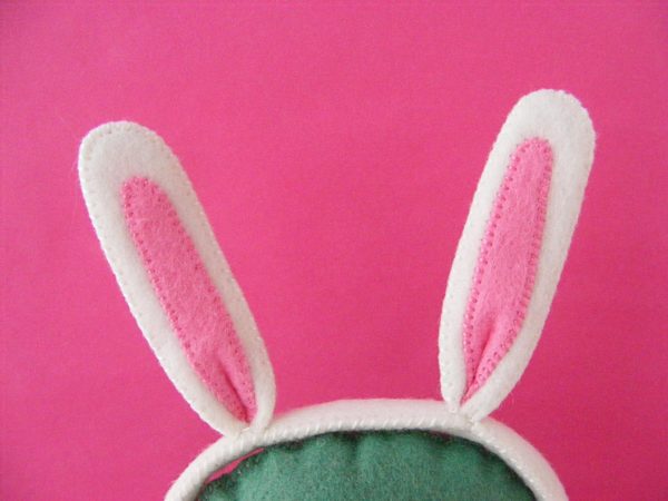 Close up on felt bunny ears made with a free pattern from Shiny Happy World