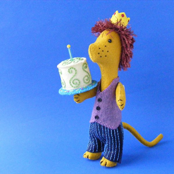 Leon Lion - felt lion softie holding a birthday cake. I used Turkey work embroidery for his shaggy mane.