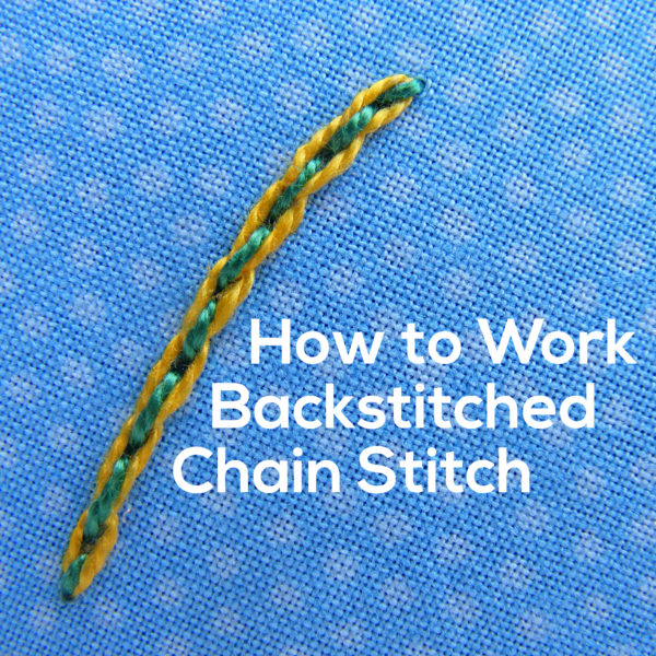 sample line of backstitched chain stitch - showing yellow chain stitching with green backstitching