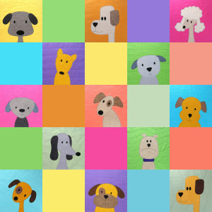 Cute puppies quilt in a checkerboard grif - pattern from Shiny Happy World