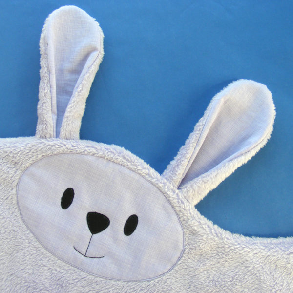 cute bunny face and ears on a cuddly soft blankie made with a pattern from Shiny Happy World