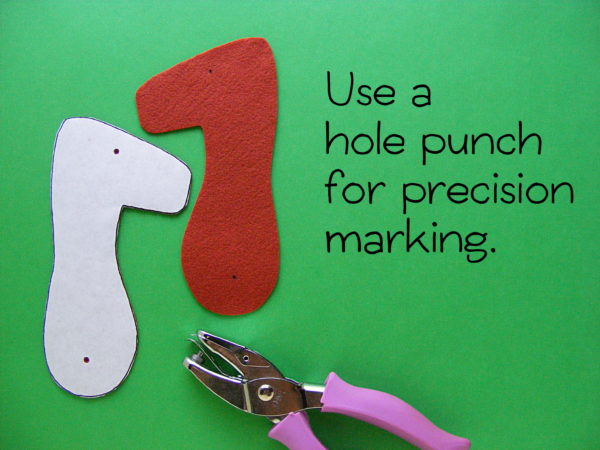 Use a hole punch to mark precisely on felt. - Handy tip from Shiny Happy World