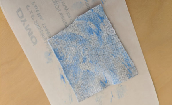fabric smeared with blue glue