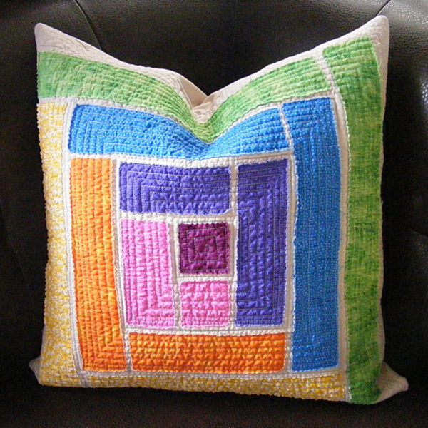 Rainbow log cabin pillow from the class Big Stitches and Patchy Patchwork