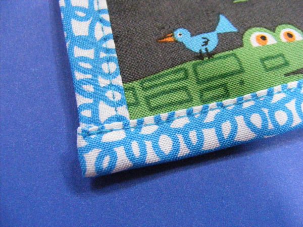 pocket for a tote bag - edges bound in contrasting fabric