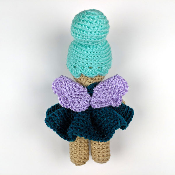 crocheted fairy doll shown from back so you can see her scalloped wings