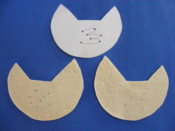 chicken pieces with guide-dots marked to show where to embroider the wings