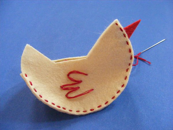 partially sewn felt hen