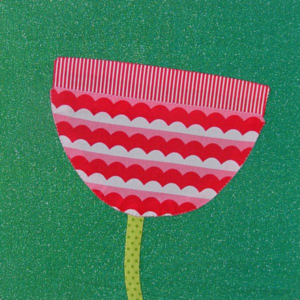red and white applique tulip - showing how to make the fabric print (stripes) do extra duty for you