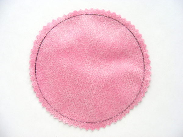 making coasters - sewn circle, cut out with pinking shears