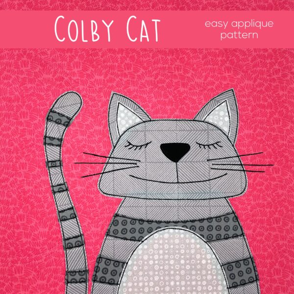 Colorful applique cat quilt pattern with stitched stripes on pink background.