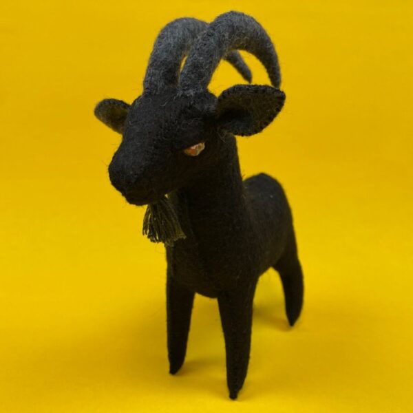 Felt Goat - Black Phillip from the movie The Witch, made with black felt and gold rhinestone eyes.
