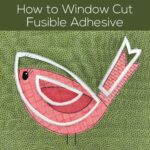 Photo of a quilt block with an appliqued bird, showing the window-cut paper backing from the fusible adhesive. Text reads: How to Window Cut Fusible Adhesive